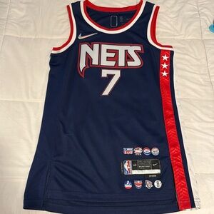 Worn once. Nets jersey city edition.